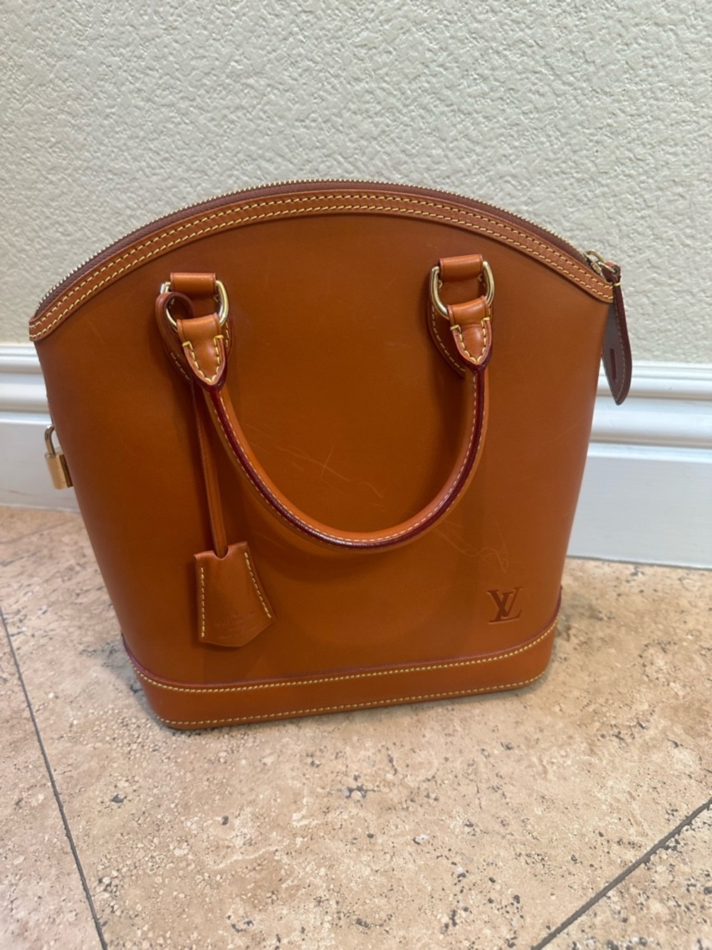 LOUIS VUITTON CARAMEL NOMADE LEATHER VERTICAL LOCKIT BAG